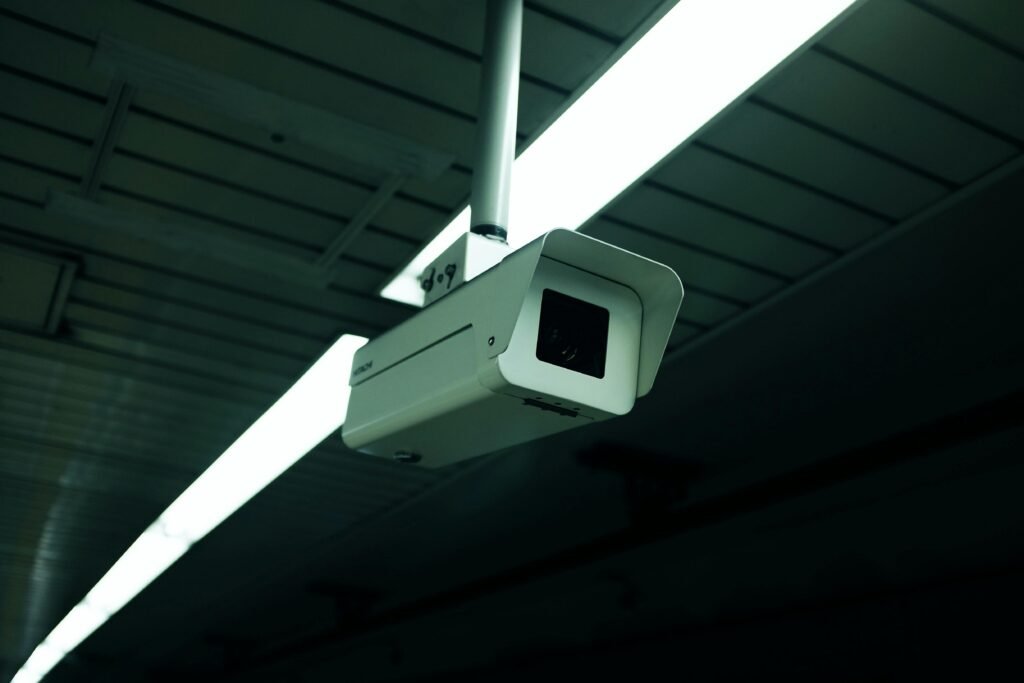 Close-up of an indoor ceiling-mounted security camera for surveillance applications.